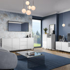 Modern living room with white furniture, blue walls, and decorative elements.