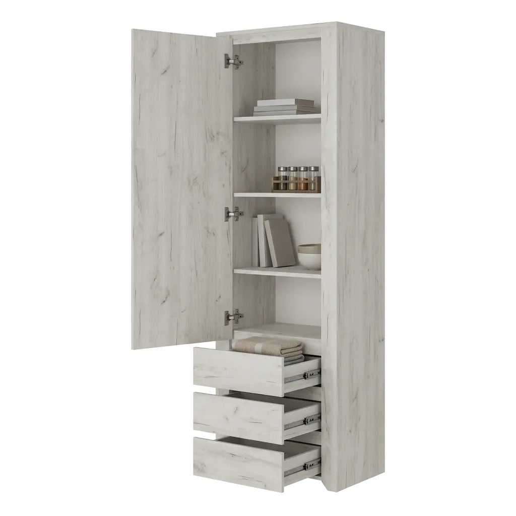 A tall, narrow storage cabinet with a light gray wood-grain finish, shown with one door open and three drawers pulled out. The cabinet is styled with books, jars, and a bowl on its shelves and drawers.