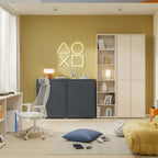 A modern home office and living room featuring a dark gray sideboard cabinet, a white shelving unit, a white office chair, and a yellow chair in a room with a mustard yellow wall and a glowing neon geometric light.