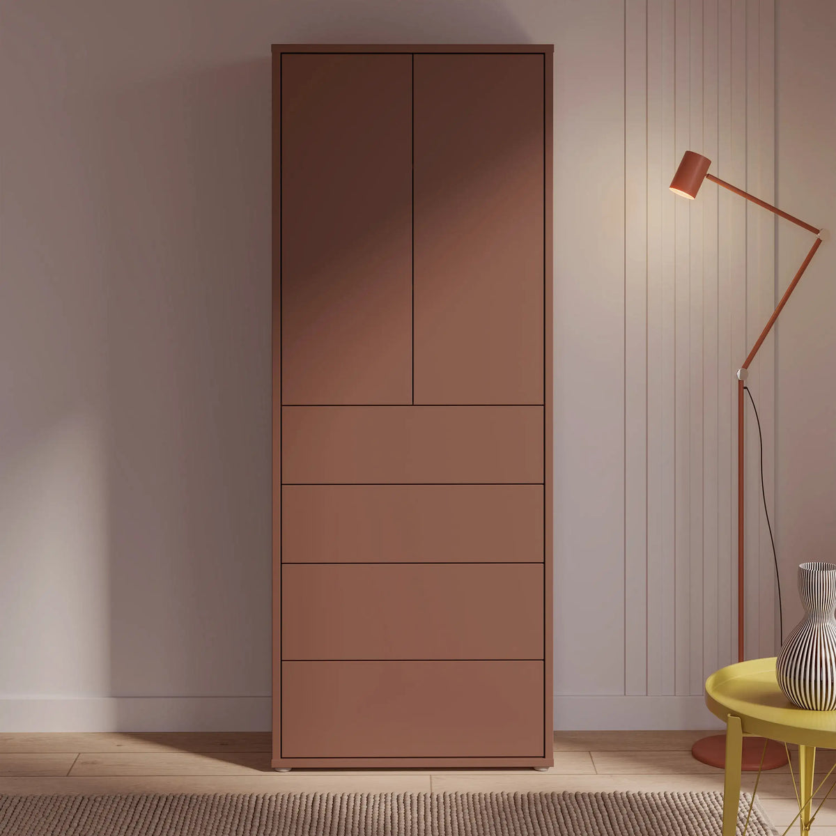 Brown wardrobe with drawers in a room with a lamp and vase.