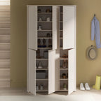 White shoe cabinet with open doors displaying various shoes against a beige wall.