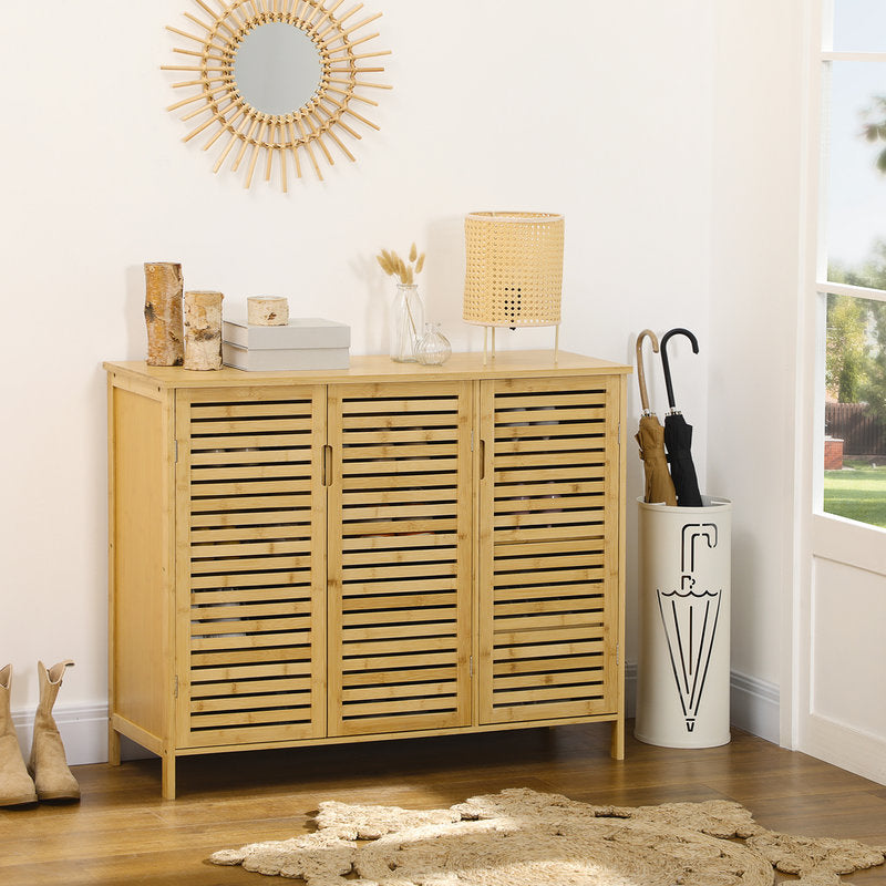 Wooden cabinet with decorative items in a room setting