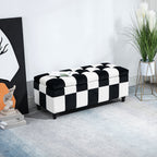 Black and white checkered ottoman in a room with decor elements.