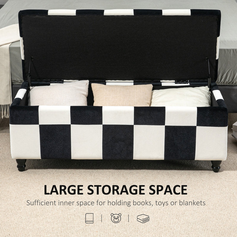 Black and white checkered storage bench with cushions on a neutral background