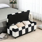 Black and white checkered ottoman with storage compartments in a bedroom setting.