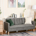 Gray sofa with decorative pillows in a living room setting