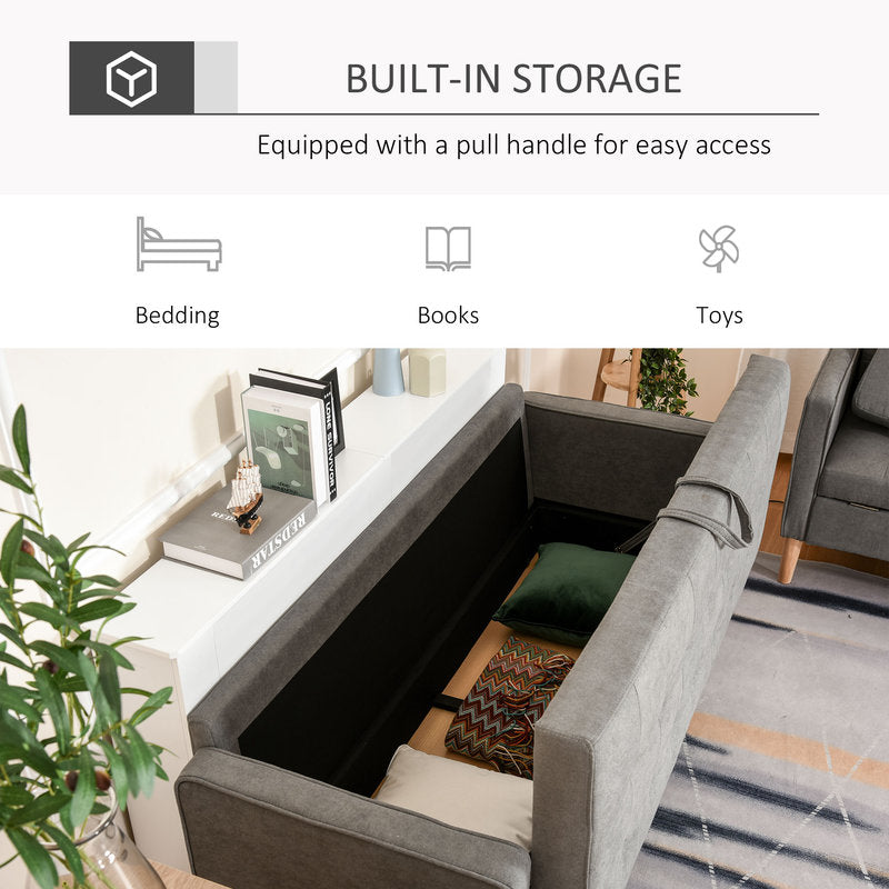 Gray sofa with built-in storage compartment, pull handle, and icons for bedding, books, and toys.