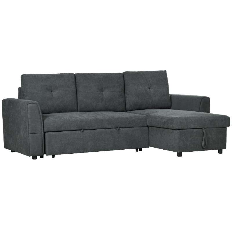 Dark gray sectional sofa with ottoman on a white background
