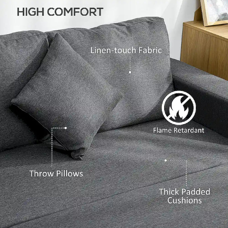 Gray sofa with throw pillows and thick padded cushions, labeled for comfort features.
