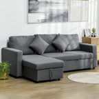 Gray sectional sofa in a living room with a painting on the wall.