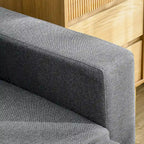 Gray upholstered headboard against a wooden panel background