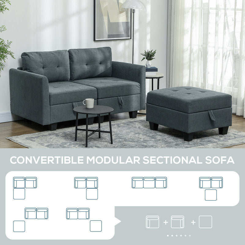 Gray convertible modular sectional sofa with ottoman in a living room setting.
