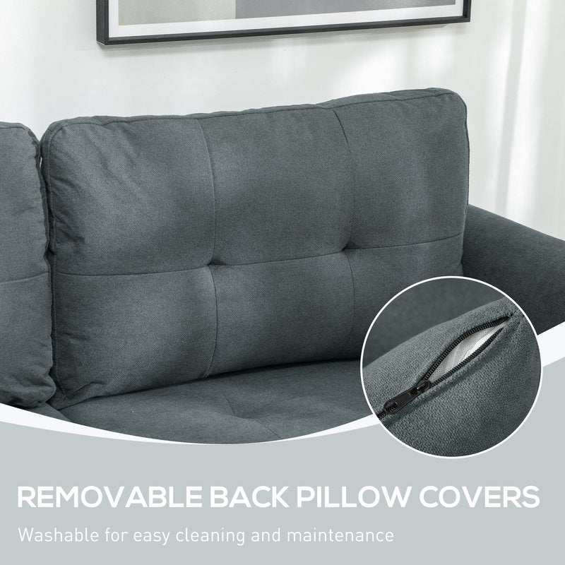 Gray sofa with removable back pillow cover feature, close-up of zipper.