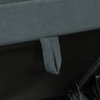 Close-up of a gray fabric surface with a small pocket detail.