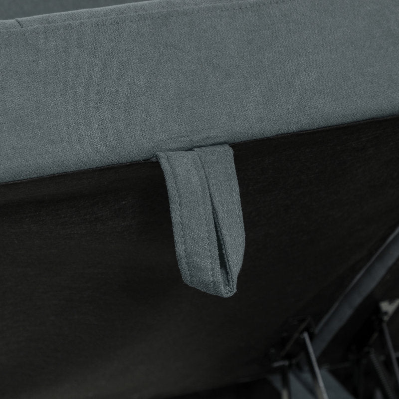 Close-up of a gray fabric surface with a strap attachment
