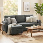 Gray sectional sofa in a living room with a wooden coffee table and decorative items.