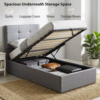 Gray upholstered bed with open storage compartment in a bedroom setting.