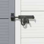 Metal door handle on a white door with gray frame