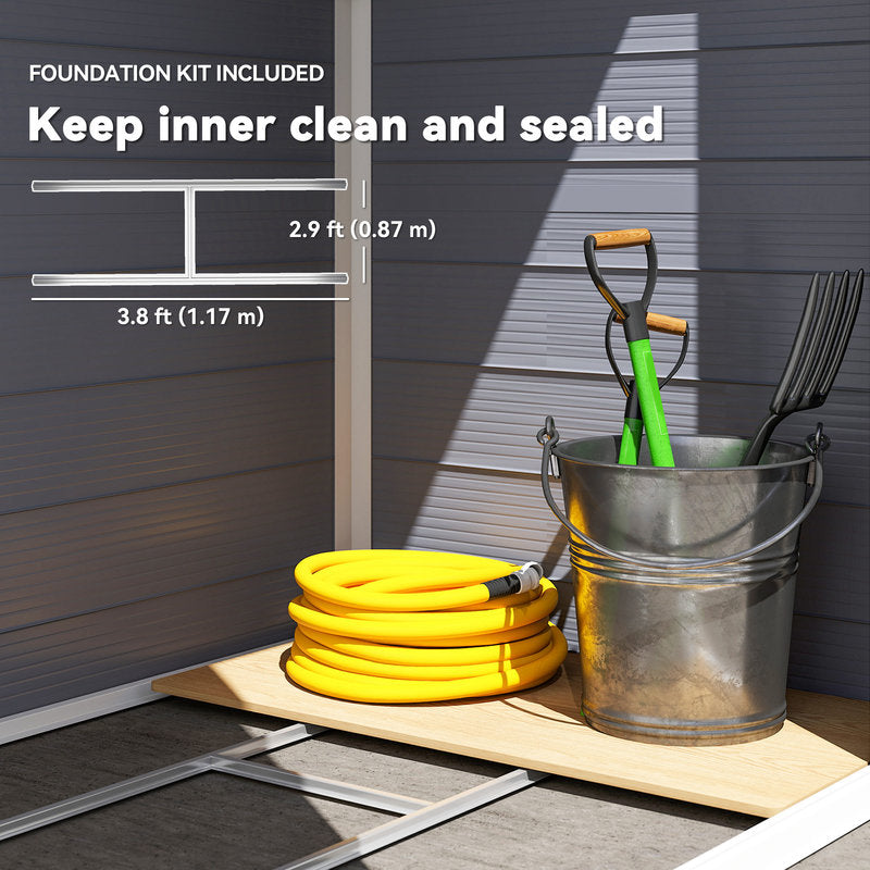 Yellow hose, metal bucket with tools, and foundation kit on a wooden platform against a gray wall.