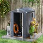 Gray garden shed with open door, life buoy, and plants in a backyard setting.