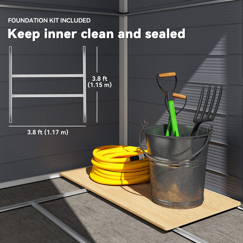 Bucket with gardening tools and hose on a wooden platform against a gray wall.