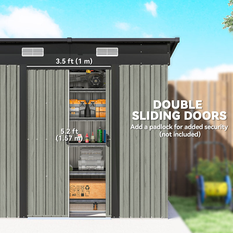 Storage shed with double sliding doors, filled with items, in a backyard setting.