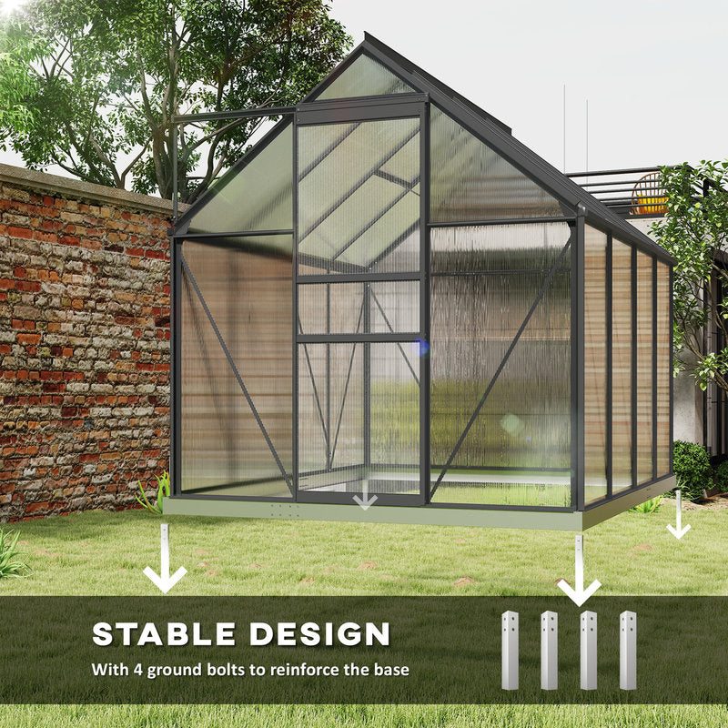Greenhouse with stable design feature highlighted on a grassy area with trees and a brick wall in the background.