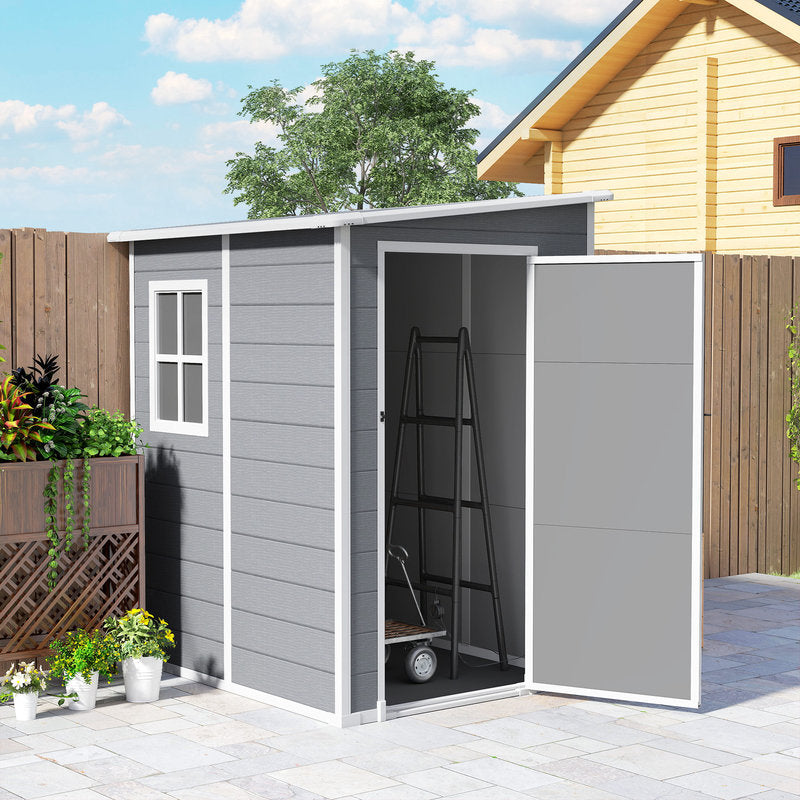Gray storage shed with clear window and the door open.
