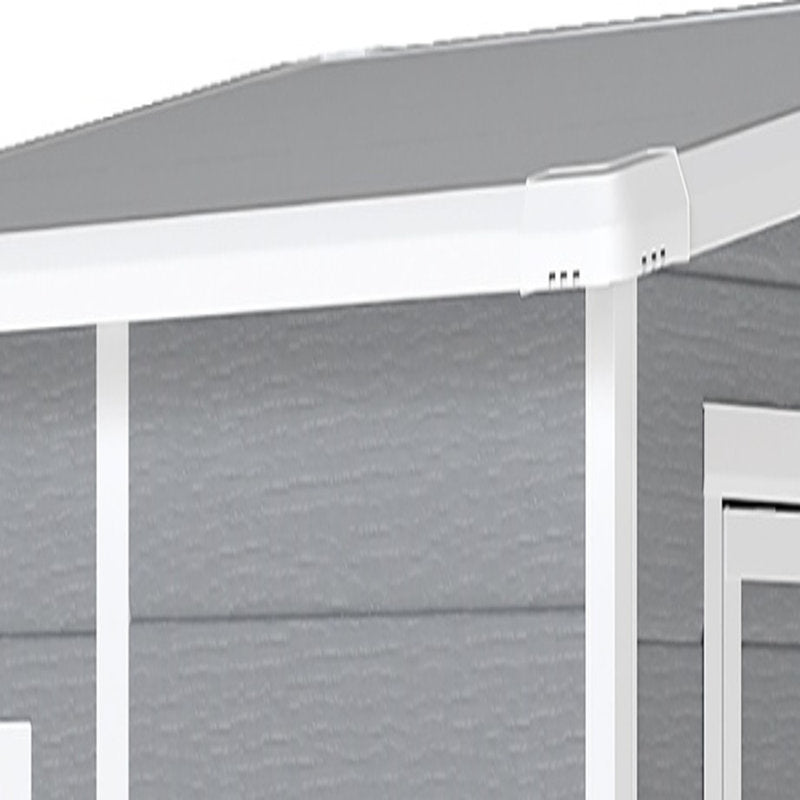 Gray outdoor structure with white support beams