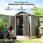 Resin construction shed with two people looking inside, surrounded by greenery.
