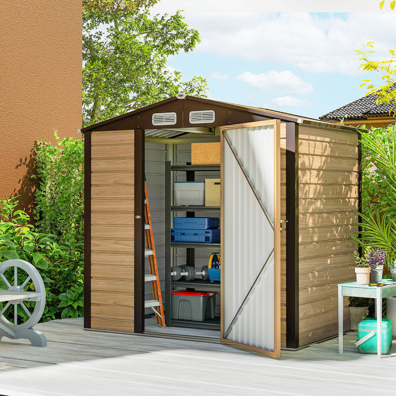 Wooden storage shed with open door, shelves, and various items on a sunny day.