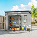 Storage shed with various items on shelves against a blue sky.