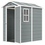 Grey storage shed with a white door and window on a white background