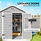 Gray storage shed with lockable doors, tools inside, and lock mechanism detail.