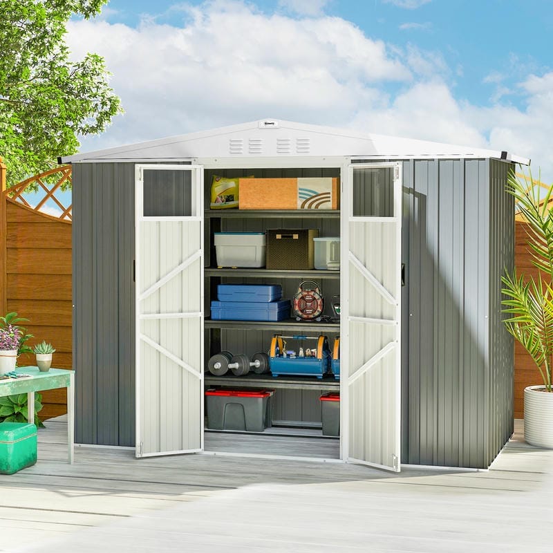 Metal storage shed with open doors showing organized shelves against a clear sky.