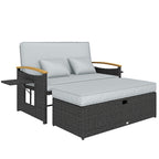 Outdoor lounge chair with gray cushions and a small table on a white background