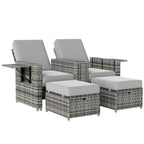 Outdoor furniture set with two chairs and two ottomans on a white background