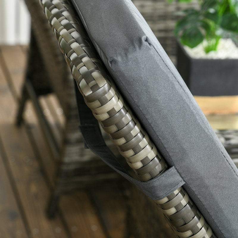 Gray cushion with woven pattern on a chair outdoors
