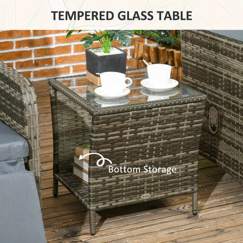 Outdoor patio table with tempered glass top and bottom storage, featuring a cup and saucer.