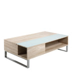 Wooden coffee table with glass top on a white background