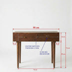 A wooden writing desk with dimension annotations showing measurements such as 90 cm width, 76 cm height, and drawer details on a plain light background.