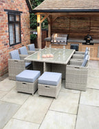 Royalcraft Wentworth 10 seater rattan dining set on paved patio