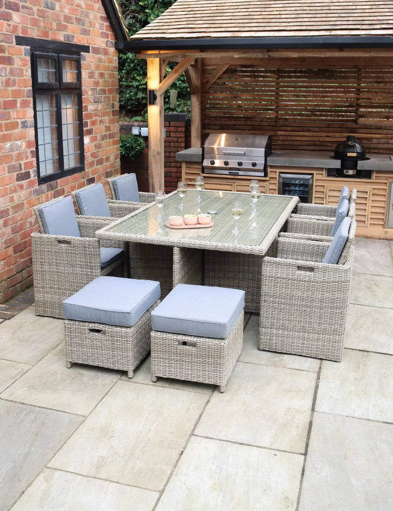Royalcraft Wentworth 10 seater rattan dining set on paved patio